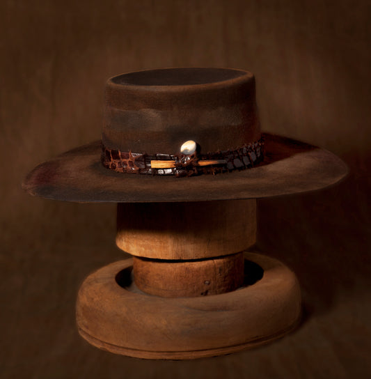 Stan Gaz Handmade 100% beaver fur felt, made in USA. Hand distressed, sewn, dyed, patina and hand shaped. Elk tooth in hat band, leather sweatband with silk lining. Hat is available in Large. It can be custom made in whatever size needed.