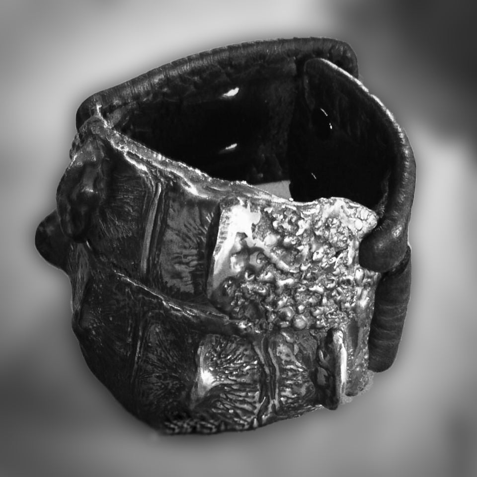 Handmade Brass crocodile bracelet with leather wrist band. Custom antique patina.