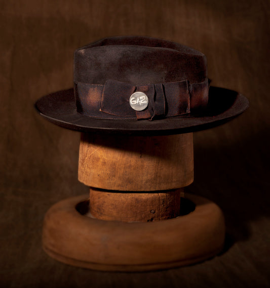 Stan Gaz Handmade 100% beaver fur felt, made in USA. Silver GAZ hat pin. Custom patina and distressed, hand sewn and shaped. Leather sweat band with silk lining. Hat is available in Medium. It can be custom made in whatever size needed.