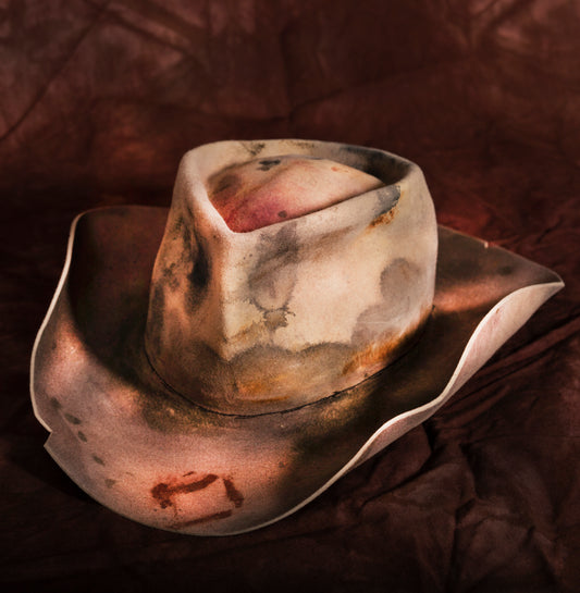 Hand dyed, distressed beaver fur felt hat is perfect for your next road trip. It has a branded leather sweat and is custom shaped. Inspired by western roads I grew up walking and driving.