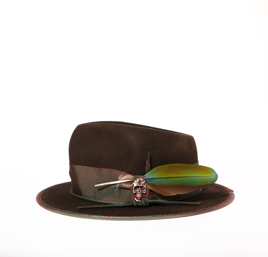 I grew up in the Mojave desert and the Green Mojave rattlesnake was the most feared creature you could run into while taking a hike or camping in the desert landscape. This hat was inspired by my home town. I grew up in the Mojave desert and the Green Mojave rattlesnake was the most feared creature you could run into while taking a hike or camping in the desert landscape. This hat was inspired by my home town. Green Mojave 100% Beaver Fur Felt, custom