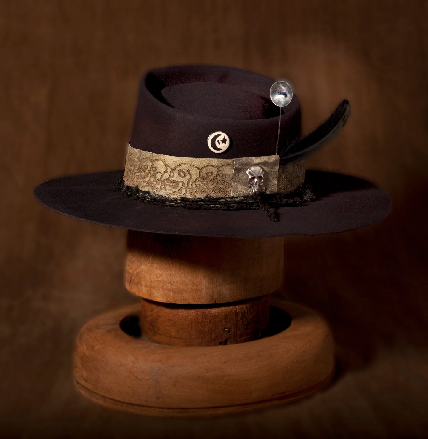 Stan Gaz Handmade, 100% beaver fur felt, made in the USA. Silver radio telescope hat pin, silver hand carved skull. Custom branded dyed leather hat band. Hand sewn. This hat shape was inspired by the hat Billy The Kid was wearing in the only known photograph of him. Hat is available in Large. It can be custom made in whatever size needed. 