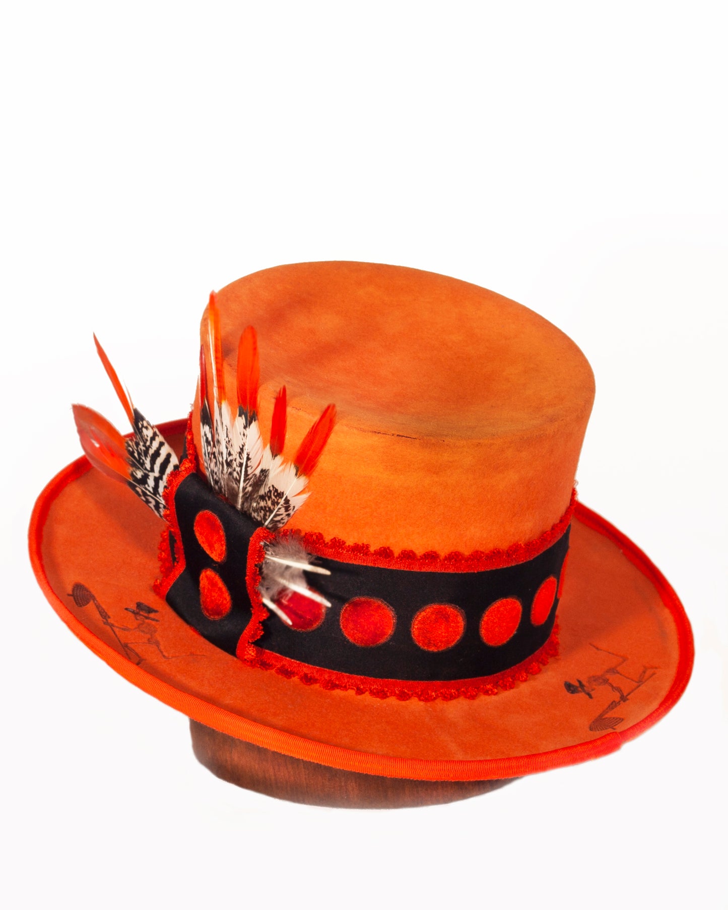 Mad Hatter is a 100% beaver fur felt custom with a vintage velvet hat band. The hat is hand dyed and has a distressed look with branded marks on inside and outside. Theres a leather branded sweat band and silk lining.