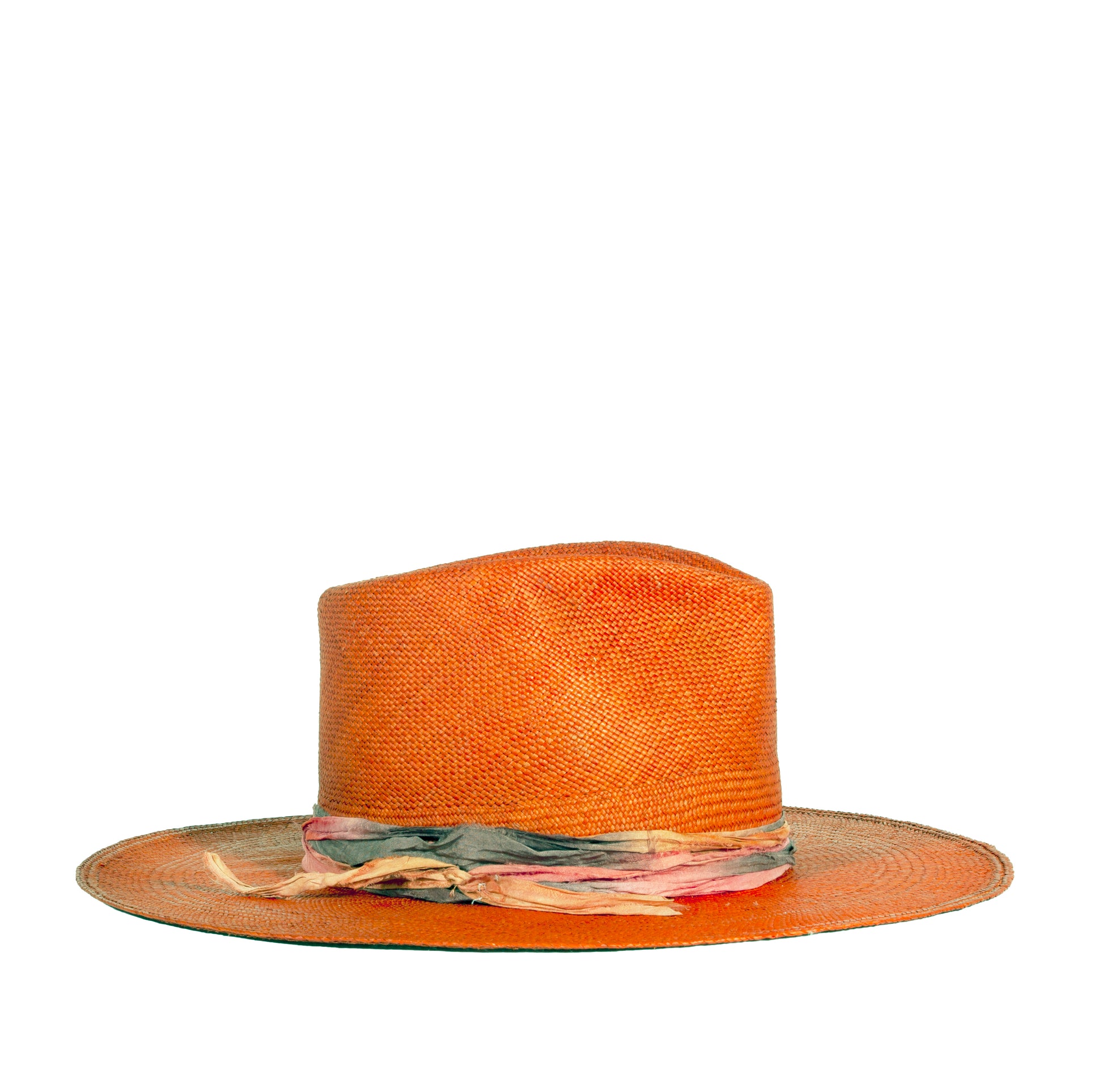 Distressed custom 100% straw hat frayed brim. Made in USA.  Every Hat Is Made To Order: No Mass Production, Less Waste, More Love. Discover Your Hat Size, Select Colors, The Design And Finishings. Ready To Ship Designs. Handmade. One-of-a-kind. Ethically Sourced. Types: Fur Felt, Handwoven Straw, Custom, Made-to-order. Inspirations: Fedora, Western, Cowboy, Bucket, Mad Hatter, Top Hat, Derby, Bowler and contemporary psychedelic.