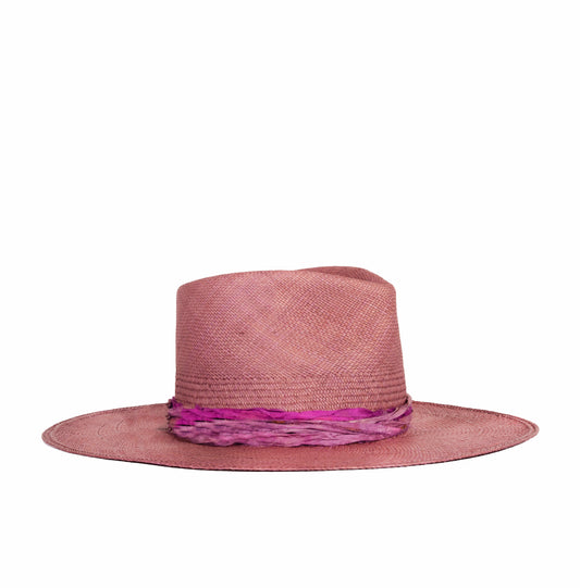 Malibu is a Distressed custom 100% straw hat frayed brim. Made in USA.  Every Hat Is Made To Order: No Mass Production, Less Waste, More Love. Discover Your Hat Size, Select Colors, The Design And Finishings. Ready To Ship Designs. Handmade. One-of-a-kind. Ethically Sourced. Types: Fur Felt, Handwoven Straw, Custom, Made-to-order. Inspirations: Fedora, Western, Cowboy, Bucket, Mad Hatter, Top Hat, Derby, Bowler and contemporary psychedelic.