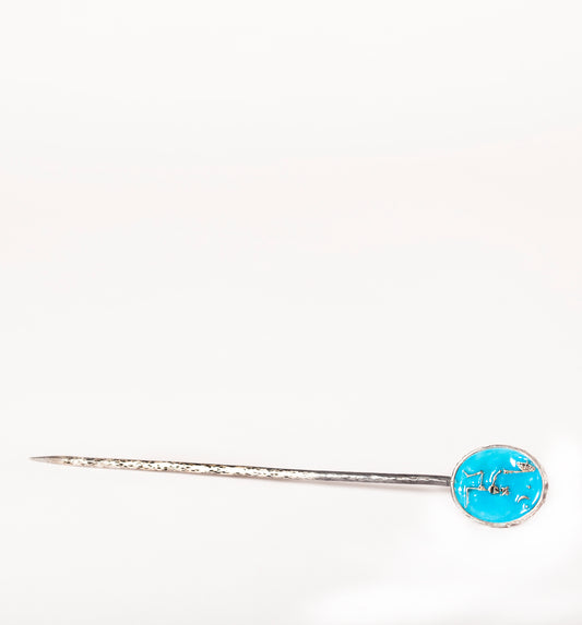 Silver skeleton turquoise enamel hand crafted hat pin.