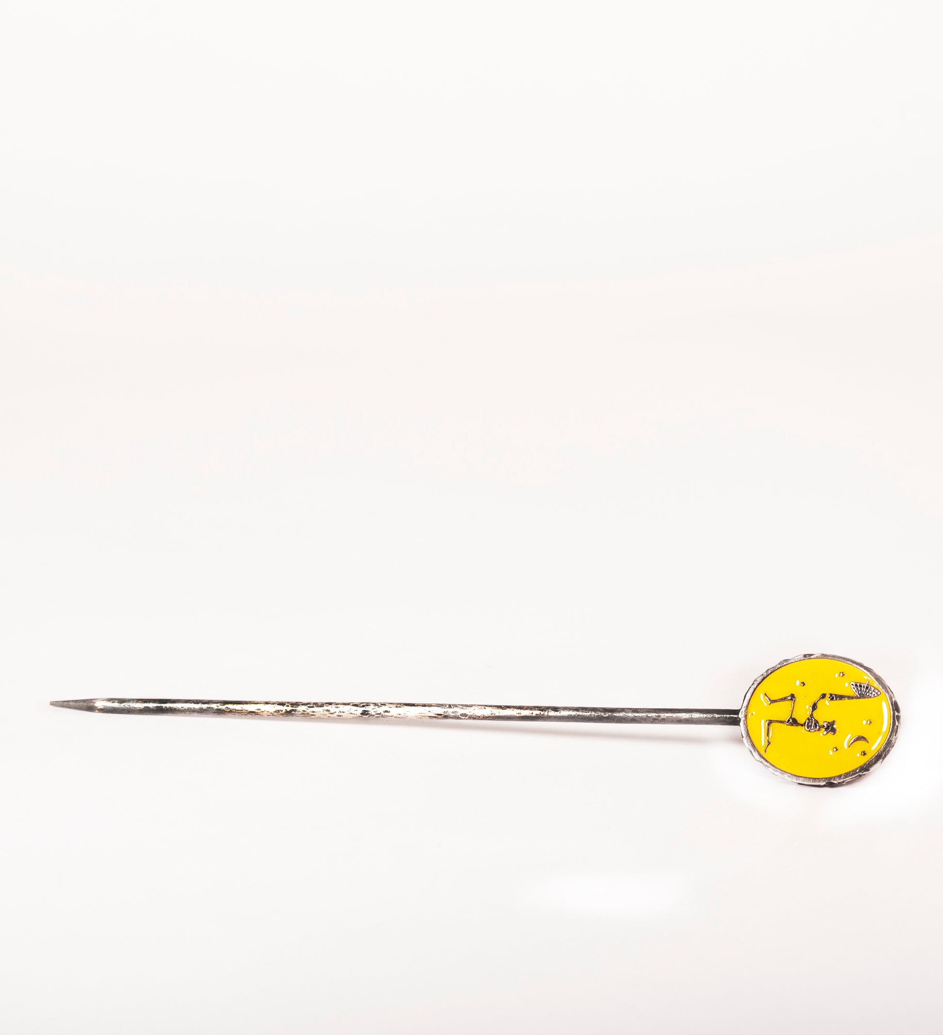 Silver skeleton yellow enamel hand crafted hat pin.